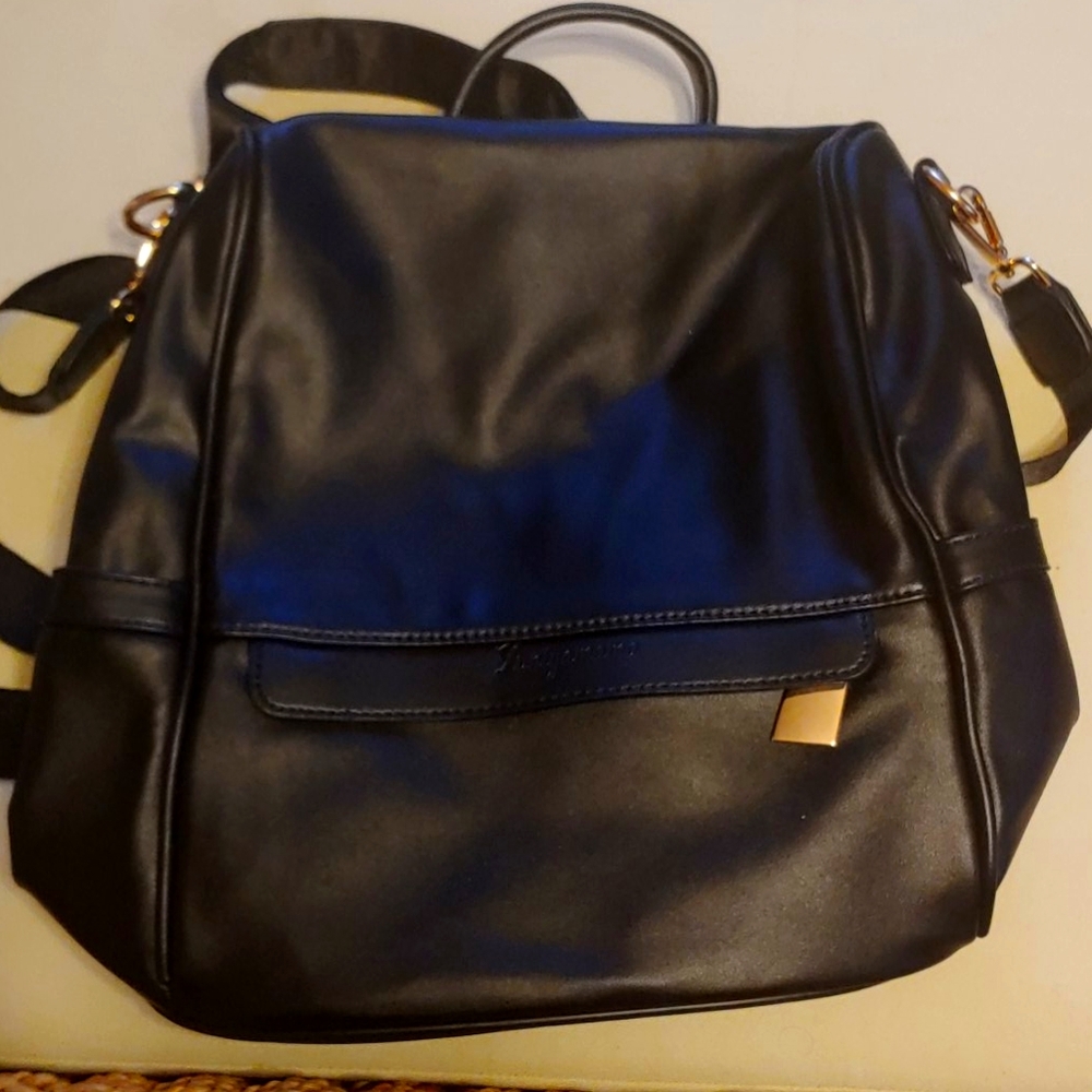 Black faux leather backpack